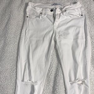 White jeans for sale with rips on the knee! Super cute
